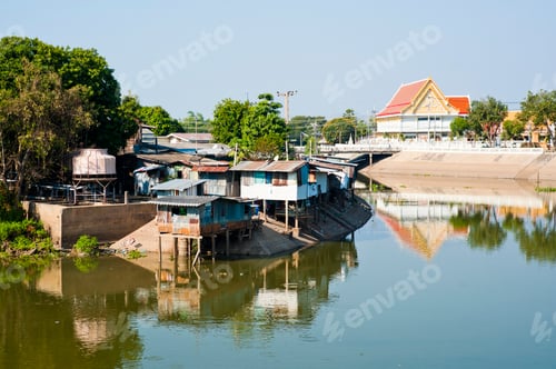Preview: Contrast of a Rich Temple and Poor Housing in Lopburi, Thailand, Southeast Asia