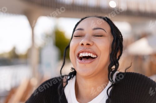 Preview: Youthful woman smiling laughing expressing happiness outdoors