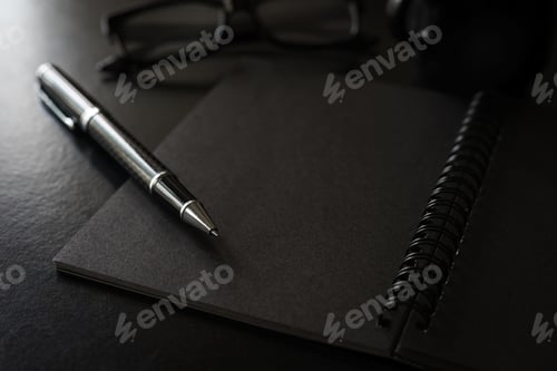Preview: Black notebook with copyspace and cup of coffee
