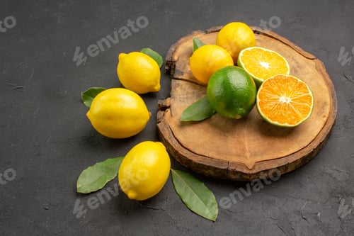 Preview: front view fresh sour lemons with leaves on dark background fruit lime yellow citrus