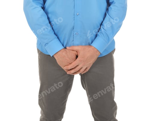 Preview: Mature man with urological problems suffering from pain on white background