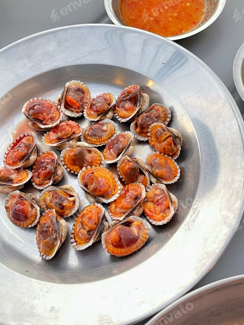 Preview: Fresh and delicious boiled cockles shell with spicy seafood sauce. Steamed cockle Boiled cockles wit