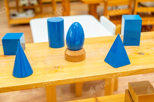 Preview: Blue geometric shapes on Montessori classroom shelf