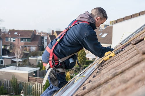 Preview: man making the construction for the solar panels