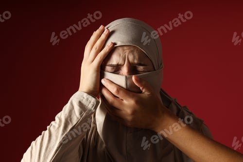 Preview: Day for the elimination of violence against women, a girl in a burqa.