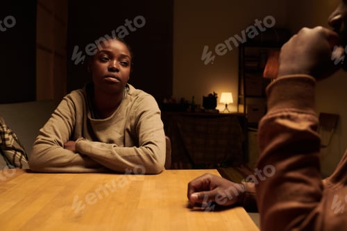 Preview: Upset woman looking at her husband