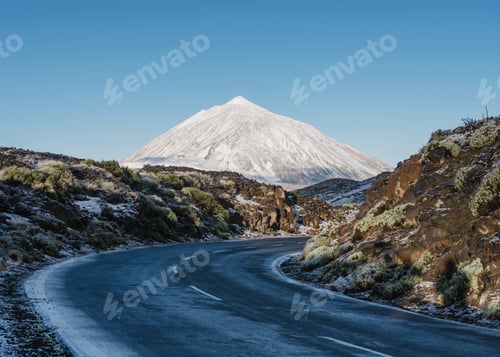 Preview: Countryside road near snowy mountain peak