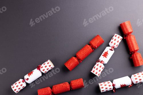 Preview: Image of christmas crackers with copy space on grey background