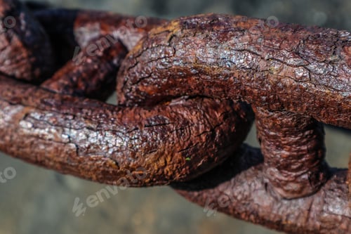 Preview: Closeup shot of an old metallic rusty chain link