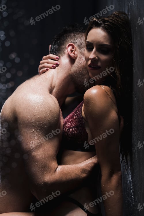 Preview: Woman in lingerie being kissed by a man