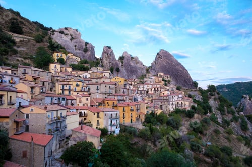 Preview: Enchanting Castelmezzano village nestled among the dramatic peaks of Italy at twilight