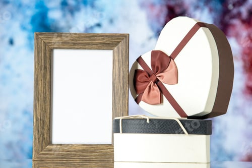 Preview: front view valentines day presents with empty picture frame on light background feeling love couple