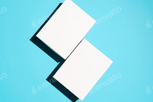 Preview: Delivery concept. Two white cardboard boxes mock up on blue background, flat lay.