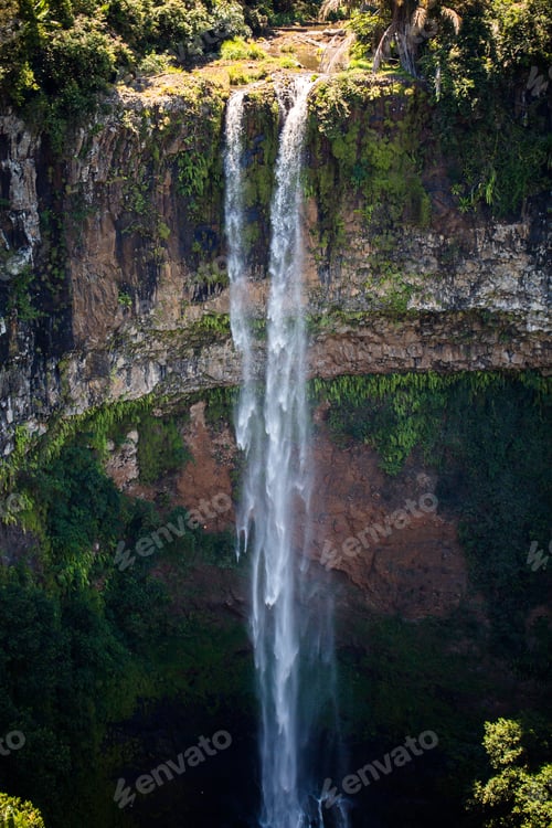 Preview: Waterfall flows into the crater of the volcano in Mauritius. National Park Chamarel
