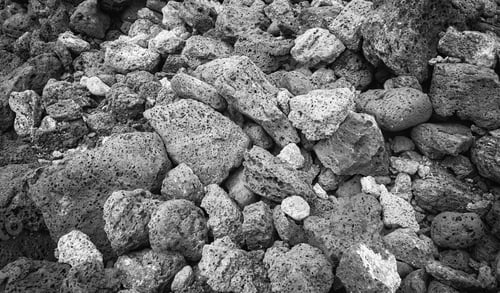 Preview: Black and white close up photo of pumice stones, nature background, Galapagos Islands, Ecuador.