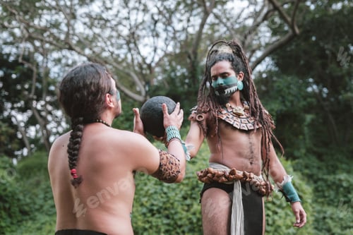 Preview: Portrait of two indigenous men with mayan garments and a rubber ball