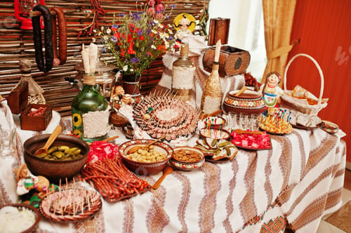 Preview: Different types of sausage at traditional ukrainian wedding reception table.