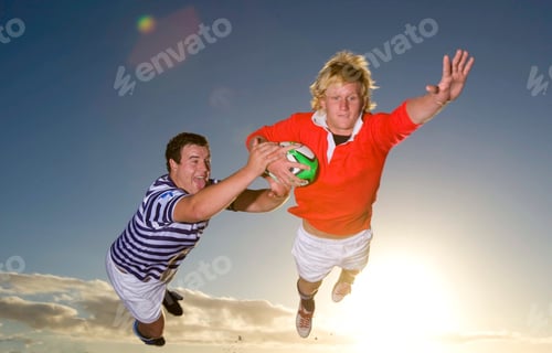 Preview: Rugby Tackle at Sunset.