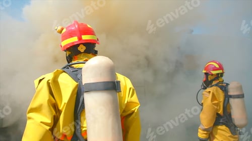 Preview: Firefighters on background of heavy smoke. Clip. Firefighters at smoking train car. Fire of