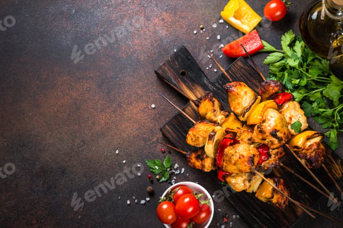 Preview: Chicken kebab with vegetables on skewers top view