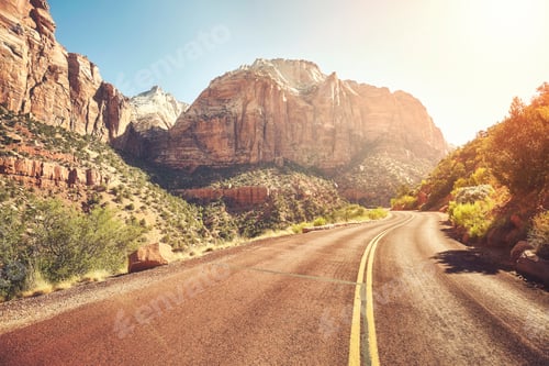 Preview: Scenic road at sunset, travel concept, USA.
