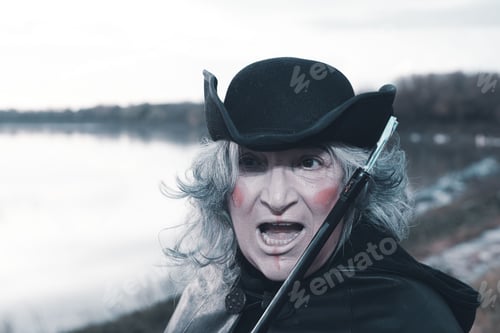 Preview: portrait armed dark evil character holding weapon outdoors cloudy evil concept