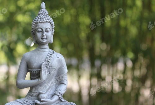 Preview: Buddha Statue in Outdoor Garden With Blurred Background