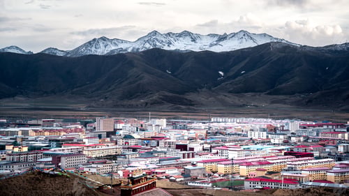 Preview: Tibetan Buddhist temple nestled in the snow-covered mountains of Qinghai Province, China.
