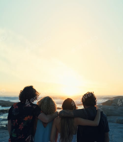 Preview: group of friends embrace on beach looking at beautiful sunset enjoying summer vacation lifestyle