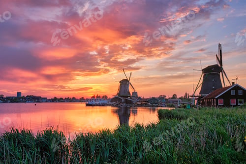 Preview: Windmills at Zaanse Schans in Holland on sunset. Zaandam, Nether