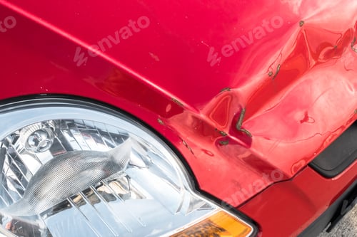 Preview: Scratches and dent on the car. Close-up.