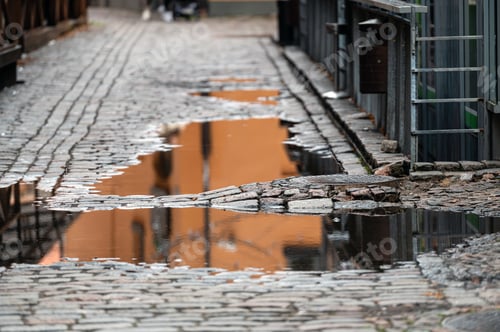 Preview: Cobblestone - old street in Riga. A view just after rain.
