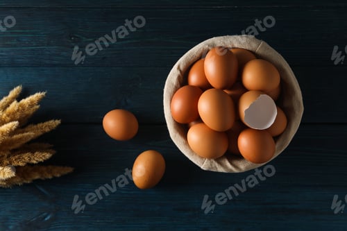 Preview: Concept of fresh and natural farm product - eggs, top view
