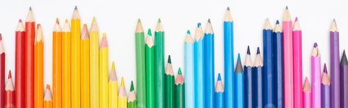 Preview: Panoramic shot of line of different sizes color pencils isolated on white