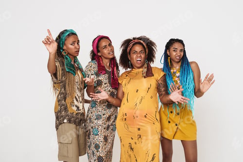 Preview: Young black four women wearing dress grimacing and gesturing at camera
