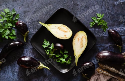 Preview: Purple vegetables arranged on a dark table