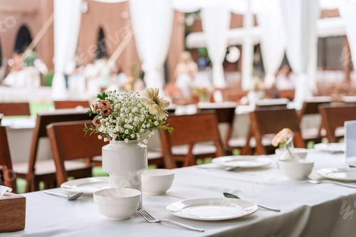 Preview: Outdoor wedding dinner table reception in romantic garden wedding atmosphere