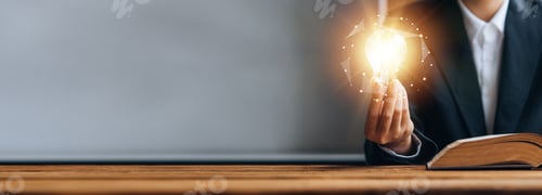 Preview: Standing woman holding glowing lamp, Creative new idea.