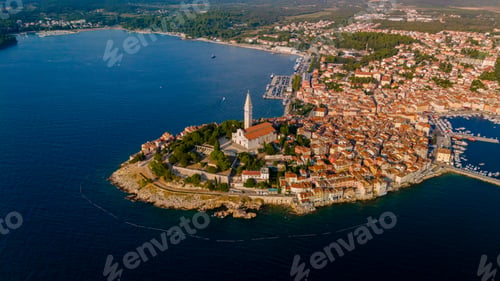 Preview: Aerial view of Rovinj Croatia showcasing its stunning coastline and historic architecture at sunset