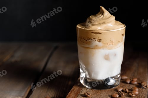 Preview: The Korean coffee drink dalgona on dark wooden background