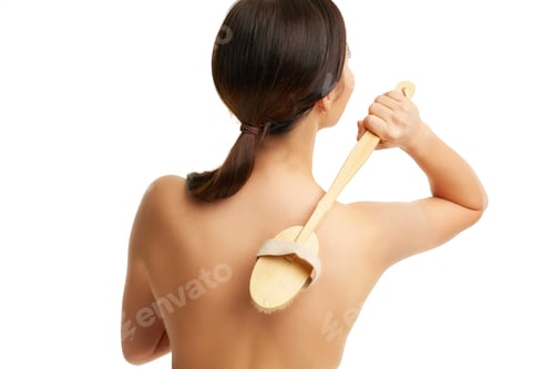 Preview: Beautiful woman cleaning skin over white background