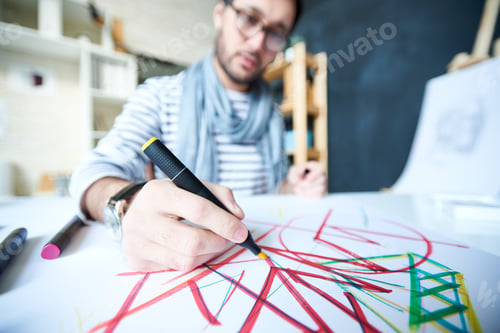 Preview: Close-up of man drawing abstraction