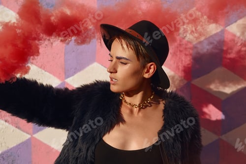 Preview: Trendy youngster with colored smoke