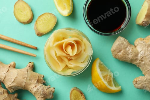 Preview: Concept of tasty eating with pickled ginger on mint background