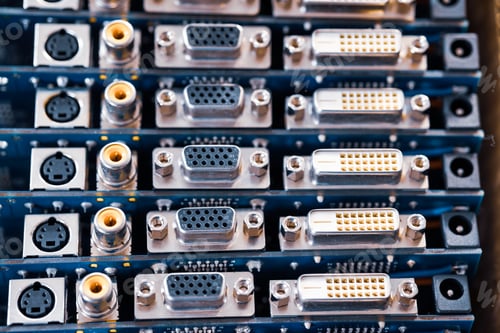 Preview: Close-up blurry metal sockets on a computer video board