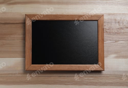 Preview: Blank chalkboard on wooden background, top view. Space for text