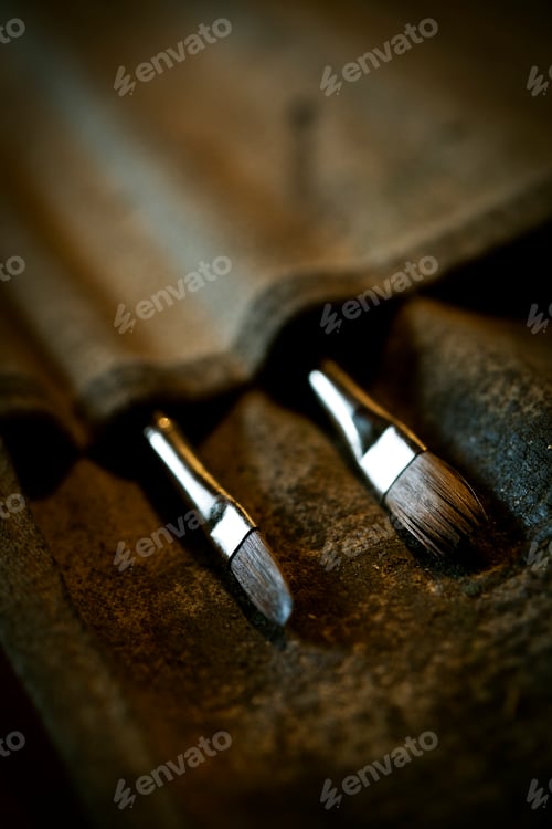 Preview: A sign writer's paint brushes in a brush wallet.