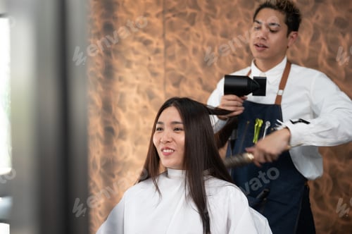 Preview: woman client person having a process to making treatment a hair with hairdresser in beauty salon