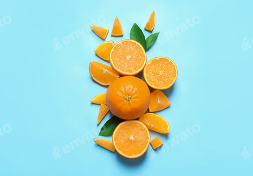 Preview: Flat lay composition with ripe oranges on color background