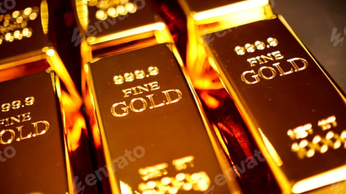 Preview: Many gold bullions brighting on the table.